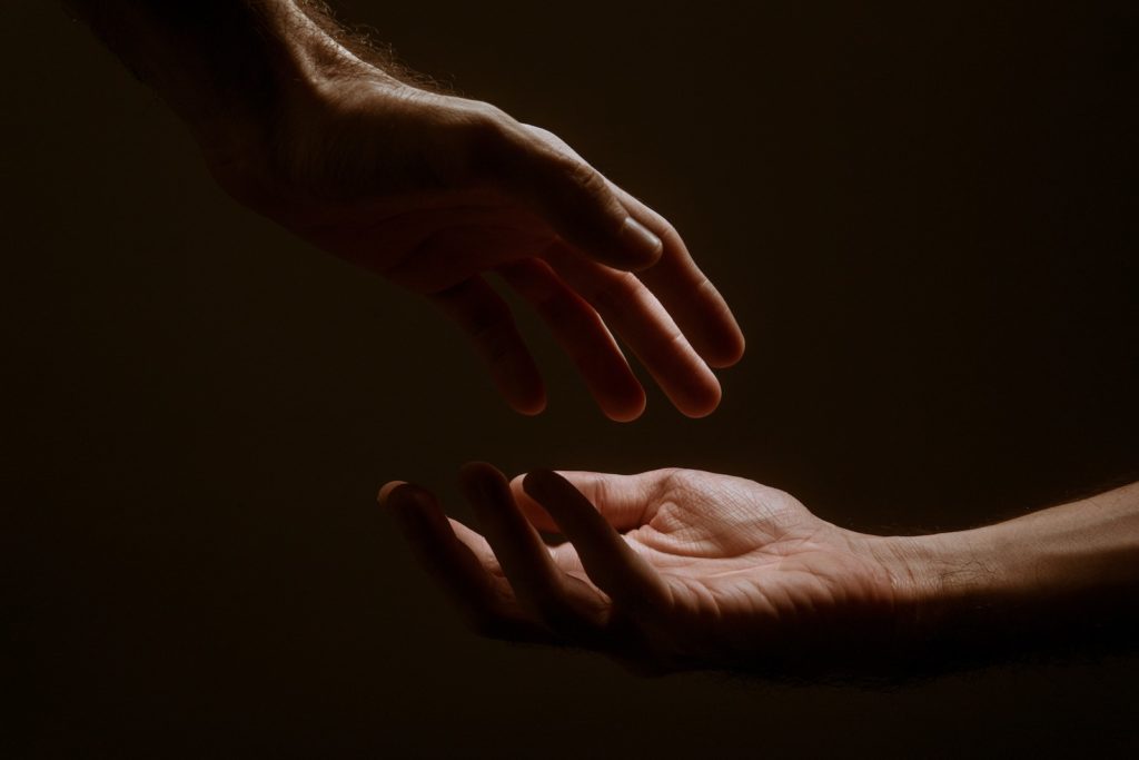 persons hand forming heart